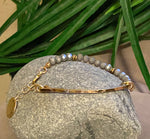 Grey Faceted Bead Stretch Bracelet With Hammered Bar