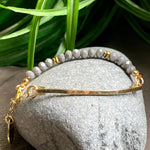 Grey Faceted Bead Stretch Bracelet With Hammered Bar