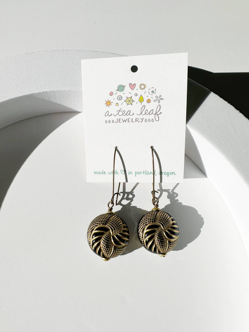 Limited Edition Dangle Earrings with Black Gold Ornate Beads